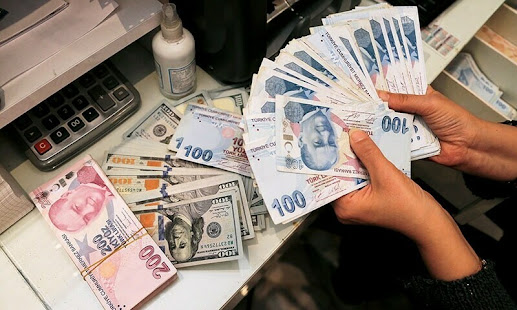 A historic devaluation of the Turkish lira has led to the removal of Finance Minister