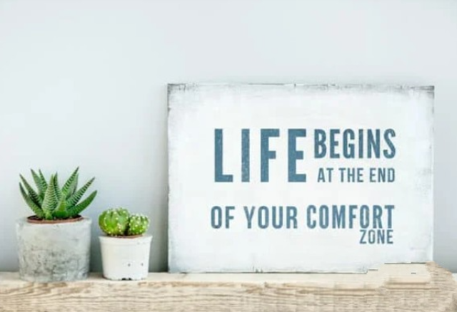 Life begins at the end of your comfort zone sign