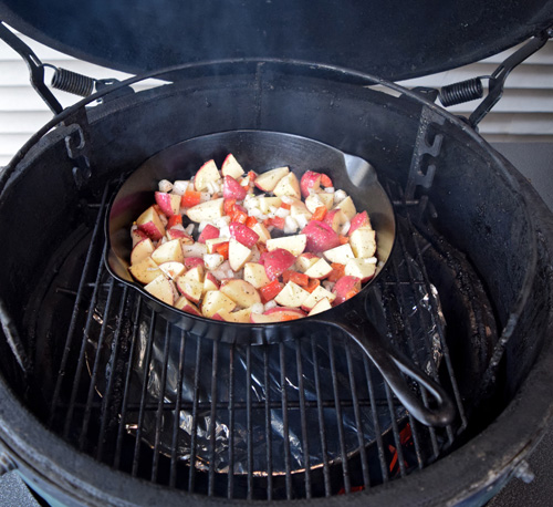 Skillet roasted potatoes on the Big Green Egg