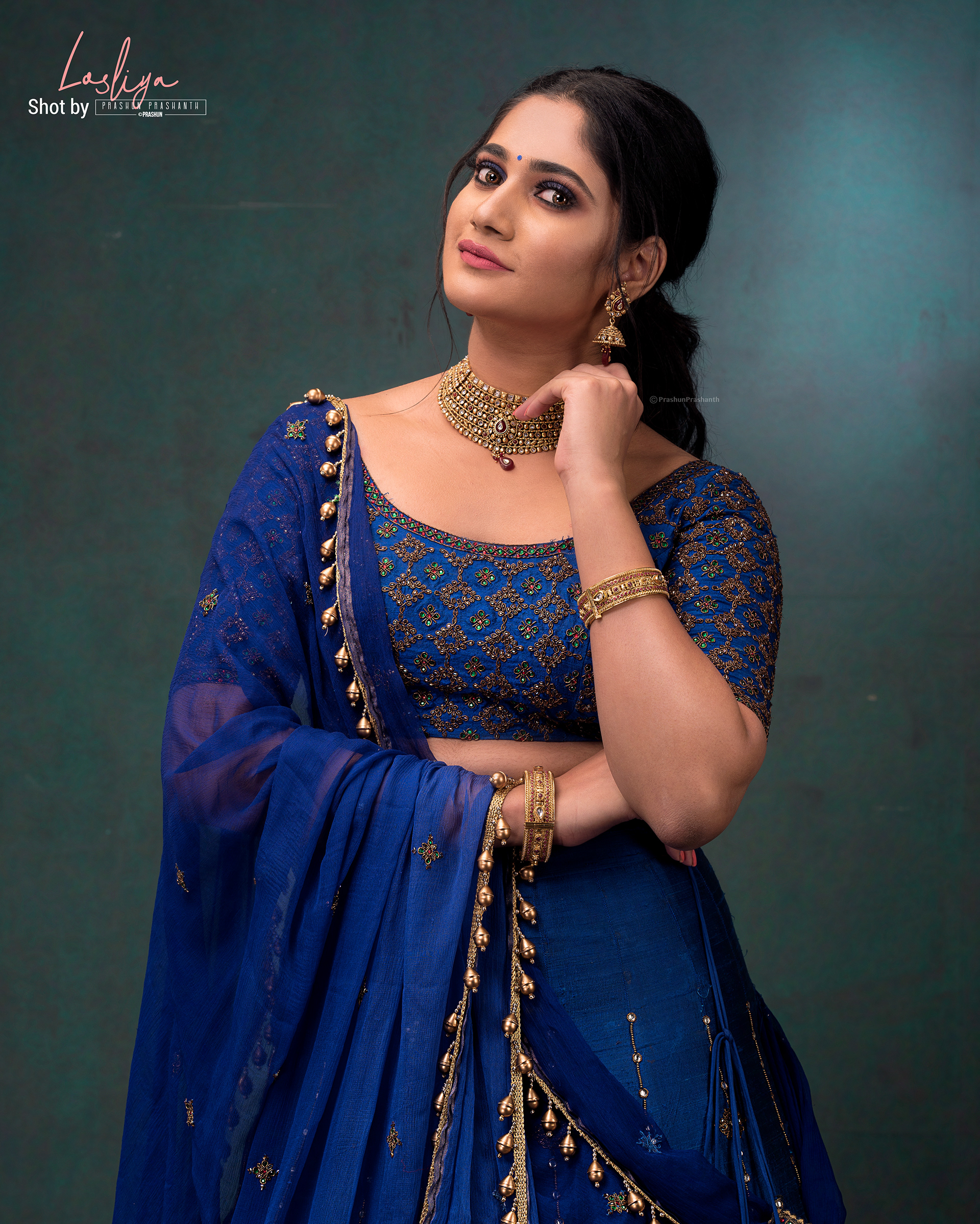 Actress Losliya Mariyanesan Latest Photos In Blue Lehenga