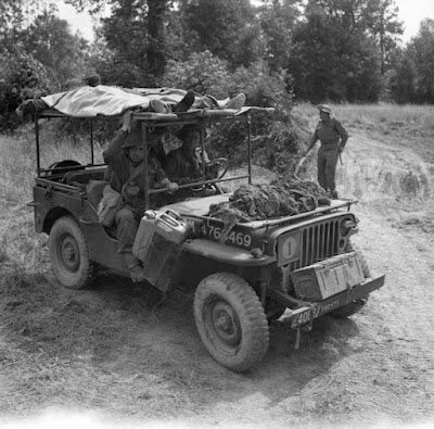 A jeep bringing casualties to a Regimental Aid Post during Operation Bluecoat the offensive south east of Caumont on the 30th of July 1944