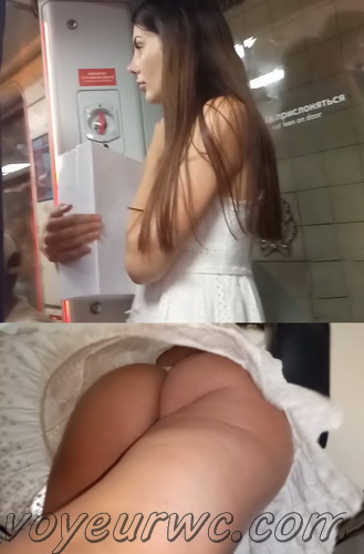 Upskirts N 3142-3149 (Upskirt voyeur videos with girls teasing with their butts on the escalator)