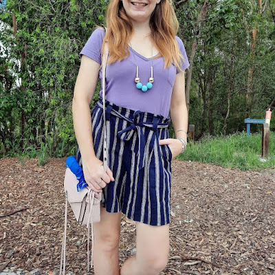 awayfromtheblue Instagram | navy stripe culotte shorts with tie waist lilac tee and blush darren bag