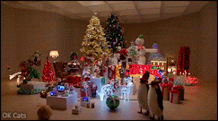 Christmas Cat GIF • How Xmas feeds for crazy cat ladies. OMG, what a disaster and total destruction!