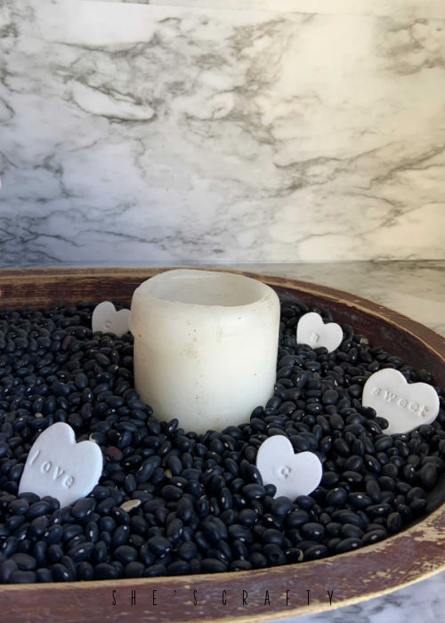 Clay hearts in candle table centerpiece