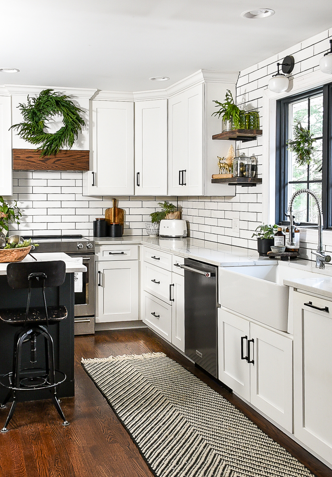 White kitchen decorated for Christmas