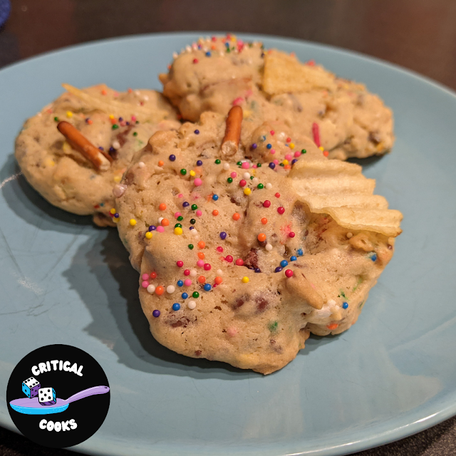 cookies covered in sprinkles, potato chips and pretzels with other things mixed in