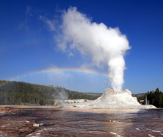 https://commons.wikimedia.org/wiki/File:Steam_Phase_eruption_of_Castle_geyser_with_double_rainbow.jpg