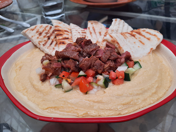 hummus, pita and ribeye