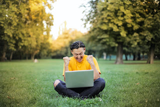 success, man on computer