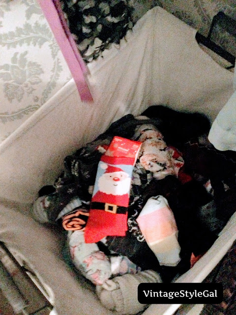 Storing socks in hamper in closet