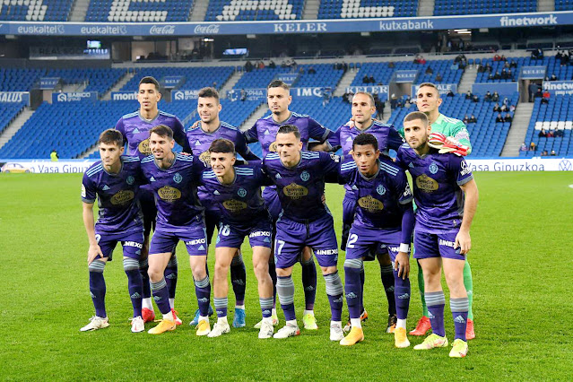 REAL VALLADOLID C. F. Temporada 2021-22. El Yamiq, Óscar Plano, Javi Sánchez, Nacho, Jordi Masip. Toni Villa, Luis Pérez, Álvaro Aguado, Roque Mesa, Gonzalo Plata, Shon Weissman. REAL SOCIEDAD DE FÚTBOL B 0 REAL VALLADOLID C. F. 2 Domingo 19/12/2021: 18:15 horas. Campeonato de Liga de 2ª División, jornada 21. San Sebastián, Guipúzcoa, Reale Arena