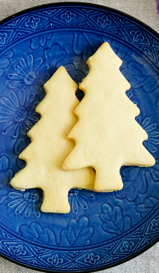 Two shortbread cookies on a blue plate.