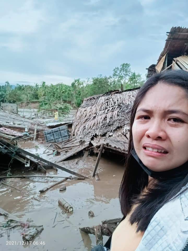 A woman from Agusan del Norte showed the house destroyed by Typhoon Odette