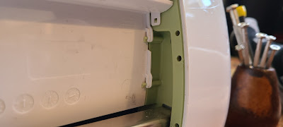 Interior, back panel clip and hooks, after prying up from below