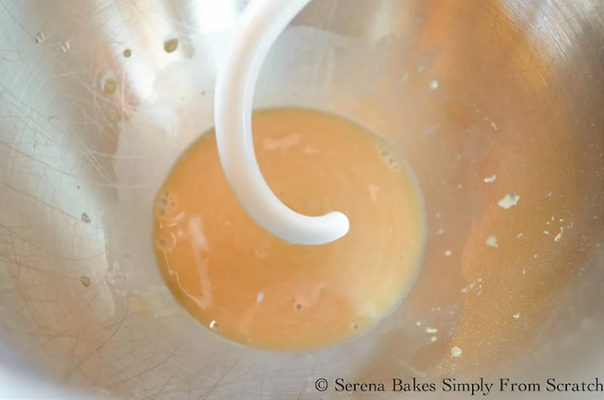 Cloverleaf Dinner Rolls recipe  yeast, sugar, and water mixed together in a mixing bowl.