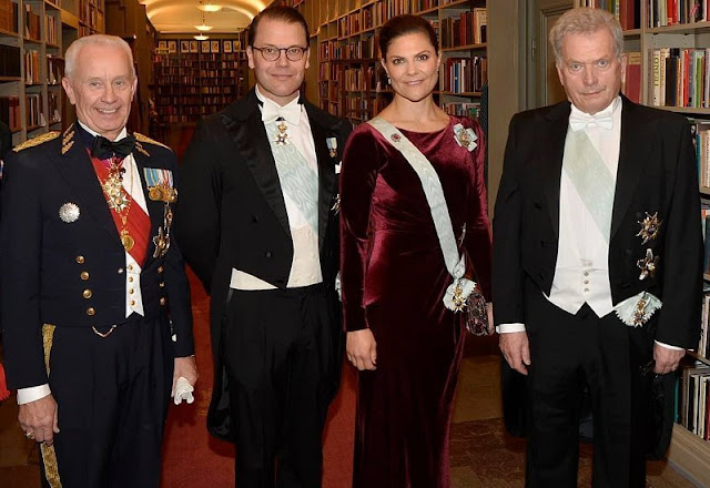 Royal Swedish Academy of War Sciences. Crown Princess Victoria wore a burgundy wine-red velvet gown, dress