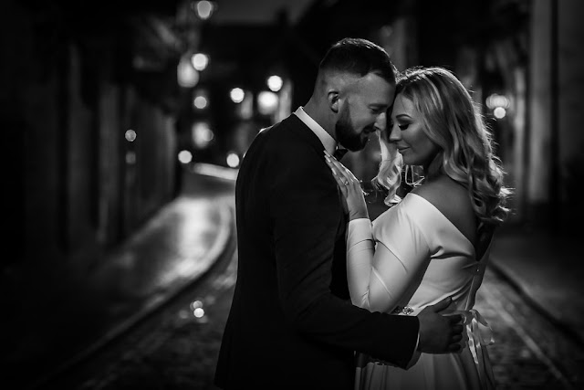 Newly-married couple on the cobbled streets of Hull's Old Town, after their wedding at Guildhall