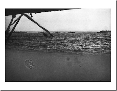 view of Normandy beach taken from a landing craft in June, 1944