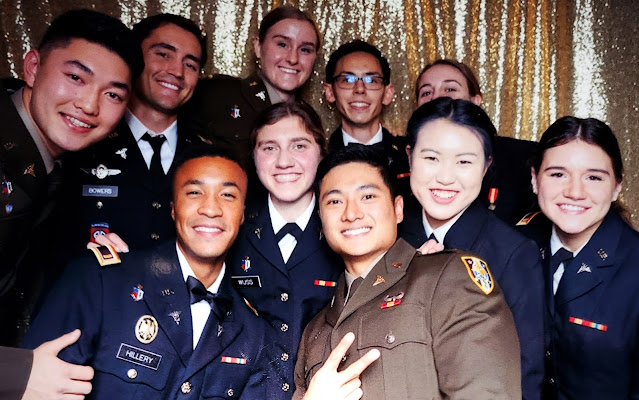 2nd Lt. Hillery (front, 2nd from left) and classmates during USU's annual "Dining Out" celebration.   (Photo credit: Courtesy of Army 2nd Lt. Brandon Hillery, USU)