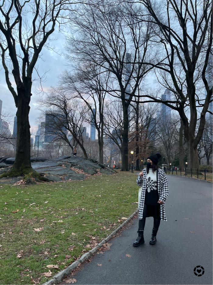 woman walking down central park nyc