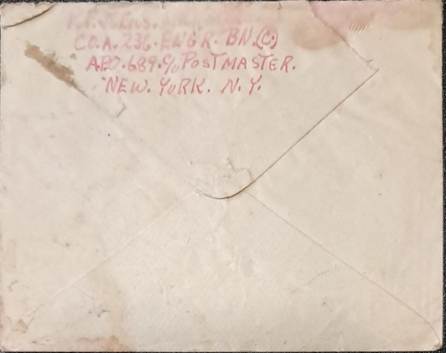 An old envelope with red writing

Description automatically generated