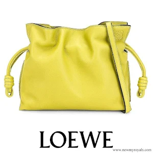 Queen Rania carries Loewe Lime Yellow Flamenco Clutch Mini Bag