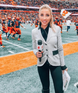 Picture of Olivia Harlan while reporting the news