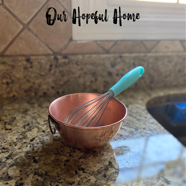 whisk with blue handle copper meringue bowl with ring