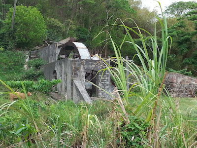 Figure 2. Ruins of the abandoned (since 2004) waterwheel at Dunfermline Estate, St Andrew (photo by Angus Thompson, courtesy the Grenada National Trust)