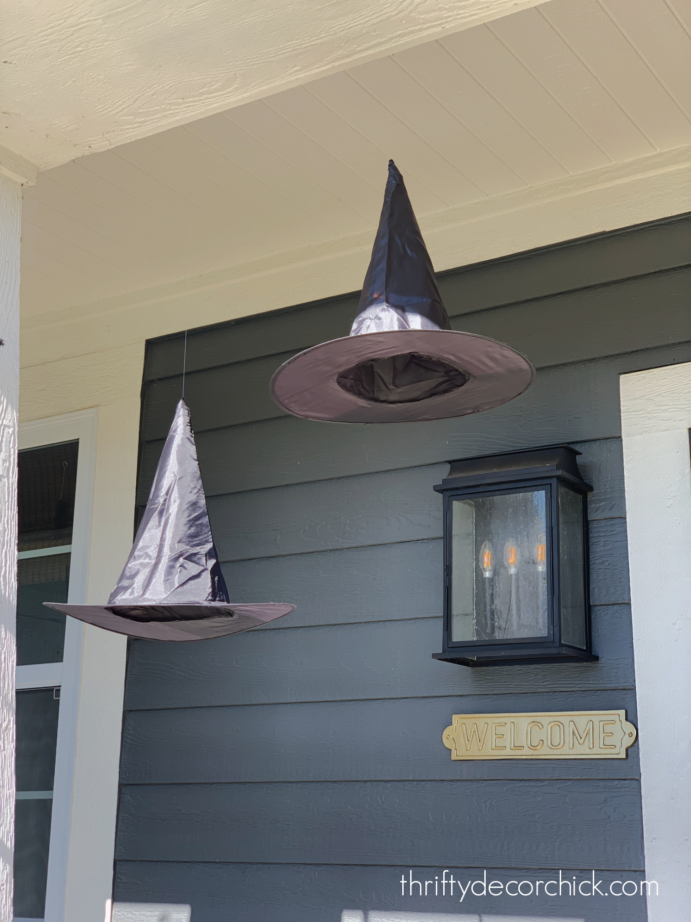 floating witch hats on front porch
