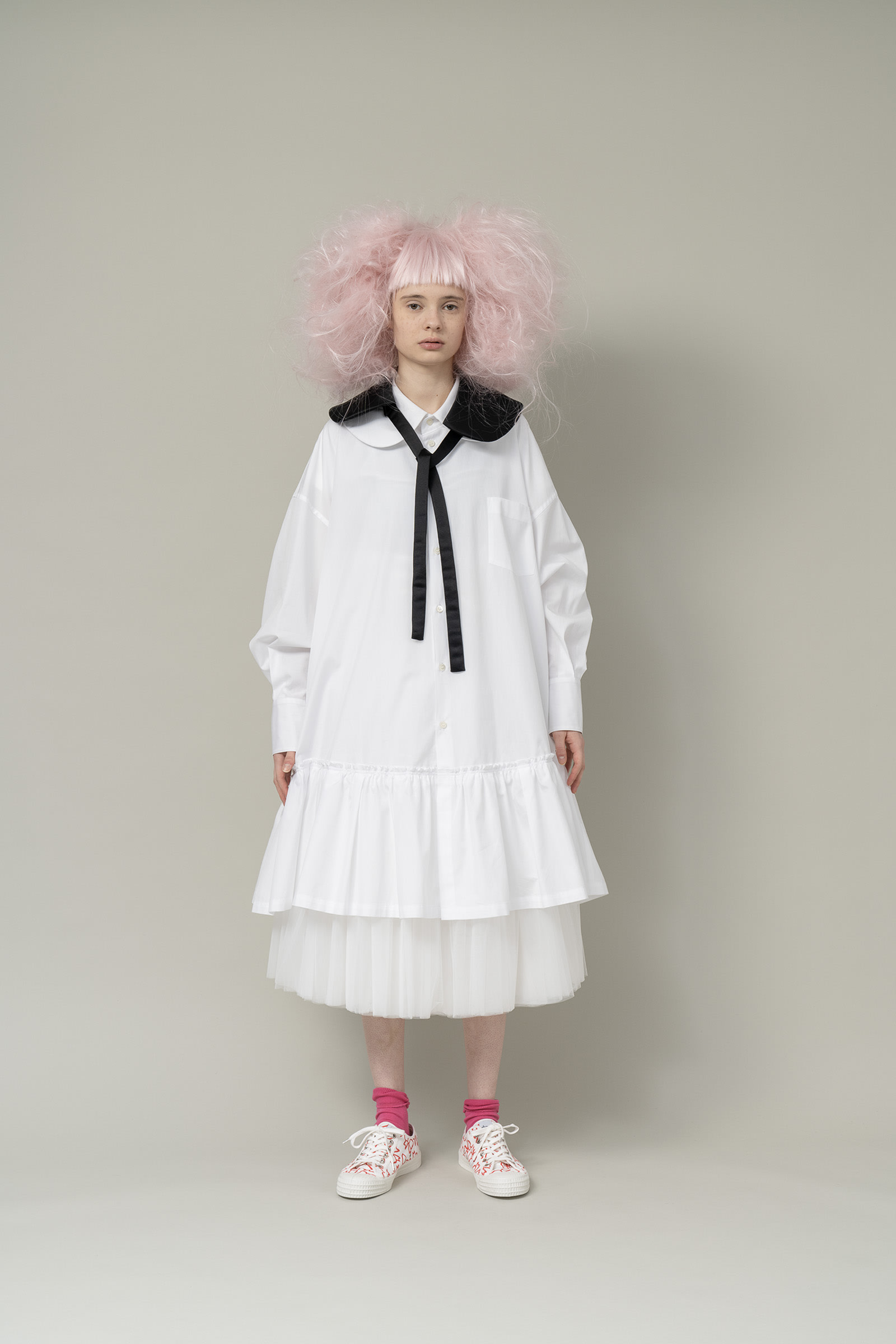 Image may contain COMME des GARÇONS GIRL Clothing Apparel Human Person Fashion Runway Long Sleeve and Sleeve