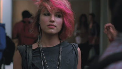 Quinn rocking pink hair and a punky attitude