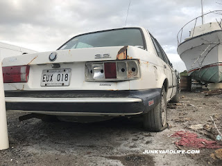 1985 BMW 323i looks wrecked and abandoned near LaParguera.