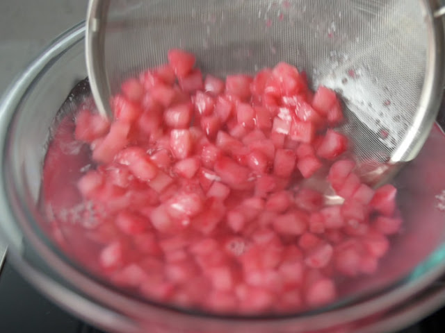 Dish out the red rubies from hot water and soak in cold water.