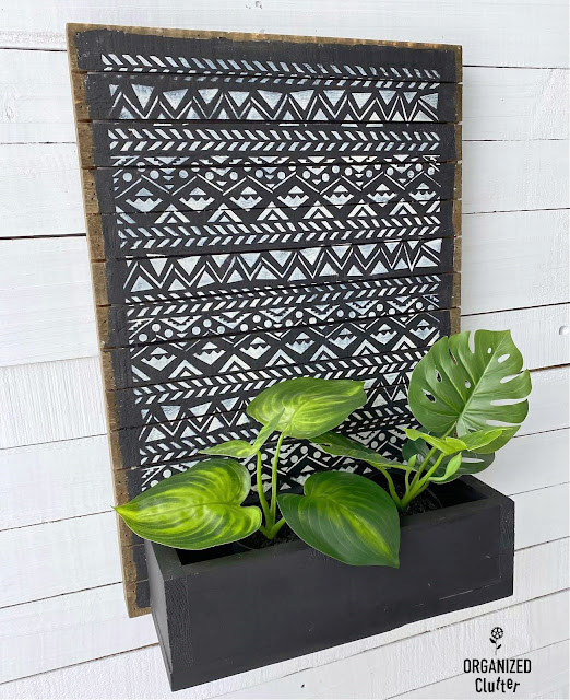Photo of a DIY Boho Mudcloth planter box made from thrift shop finds and Dixie Belle Products.