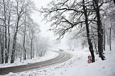 curved snowy road