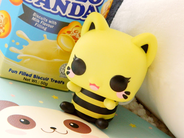 A photo showing a funko pop vinyl figure of a cat-bee character called Queen Bee Meowchi