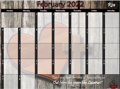 A wooden background with large red hearts center left. A black and pink themed calendar in foreground.