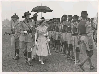 Queen Elizabeth inspecting a battalion of Nigerian Soldiers