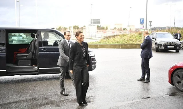 Crown Princess Victoria wore a floral blouse from Erdem x H&M collaboration collection. Charlotte Bonde gold ribbon earrings