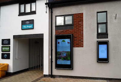 Digital display screens showing information of interest to the public, located to the rear of the Angel building in Brigg 2022