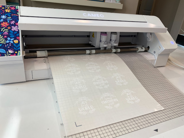 white toner printer, print and cut, uninet icolor, stickers, sticker paper