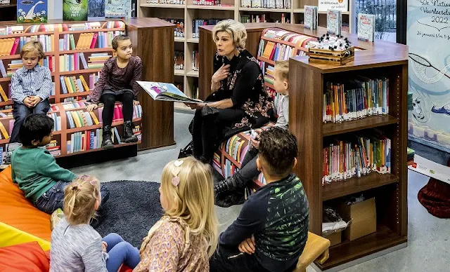 Princess Laurentien wore a metallic bronze sequin embroidered black coat by Walleska Ecochicc