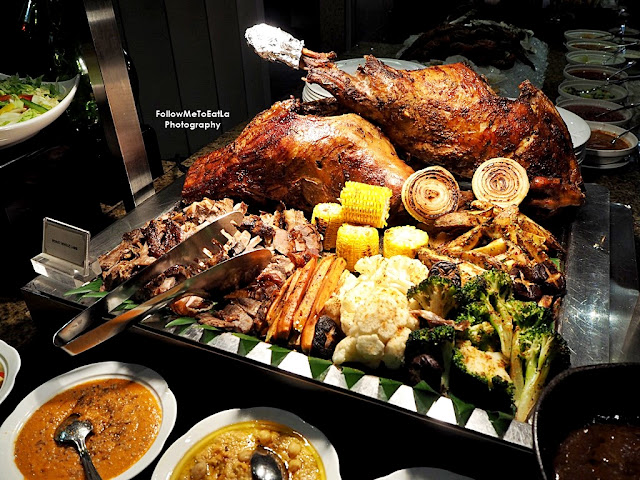 Signature Roasted Whole Lamb served with warm Arabic bread, fresh salad, homemade dips and spread.