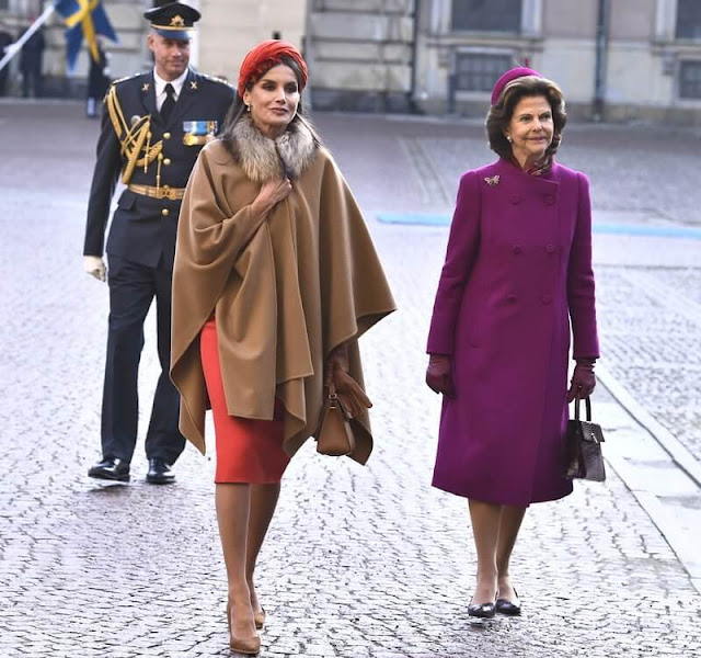Crown Princess Victoria, Princess Sofia, Queen Silvia. Queen Letizia wore a headband by Cherubina. Carolina Herrera bag. cape