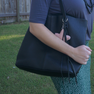 green daisy print skirt with Rebecca Minkoff medium unlined tote in black with shellac studded dome hardware | awayfromtheblue