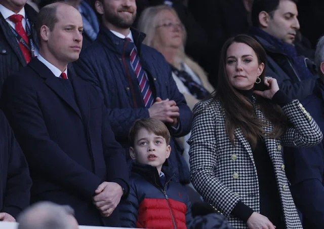 Prince William, Duchess of Cambridge and Prince George. Kate Middleton wore a new knightsbridge houndstooth coat from Holland Cooper