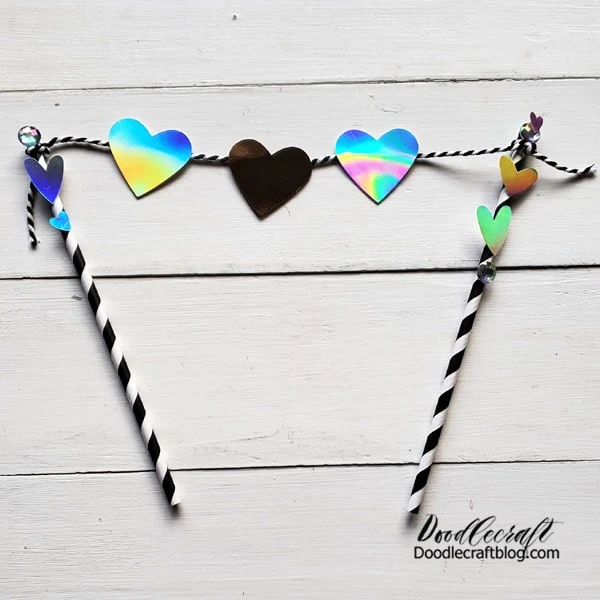 This triple heart cake topper is for the large bundt cake. I love the iridescent paper that shines in the light!