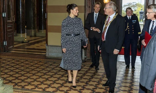 Crown Princess Victoria wore a new belted turtleneck midi dress from & Other Stories. Quidam clutch. Gianvito Rossi suede pumps